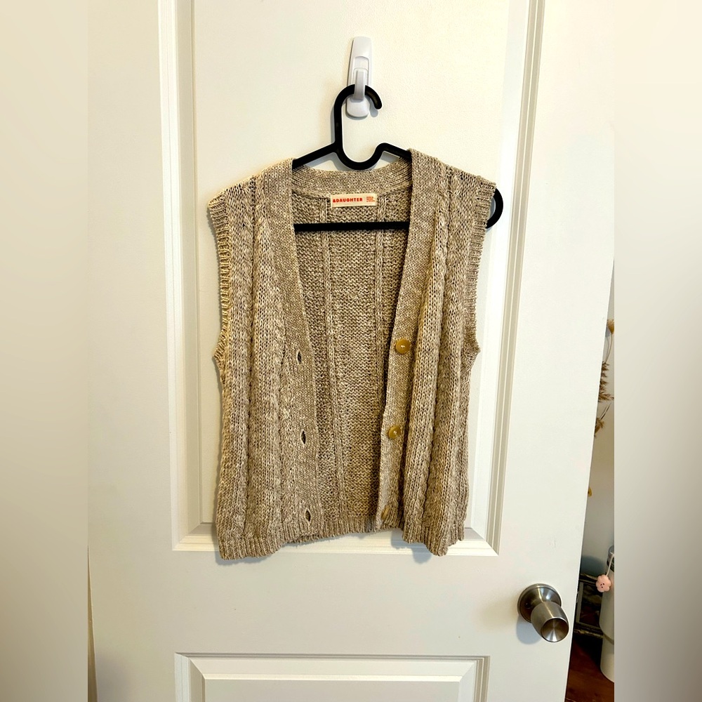 &daughter hand knitted sweater vest. No tags but never worn.
